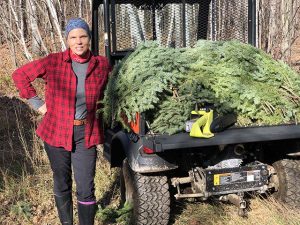 Sherry working with pine boughs