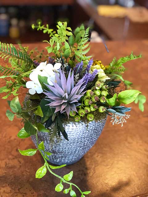 small white and green vase