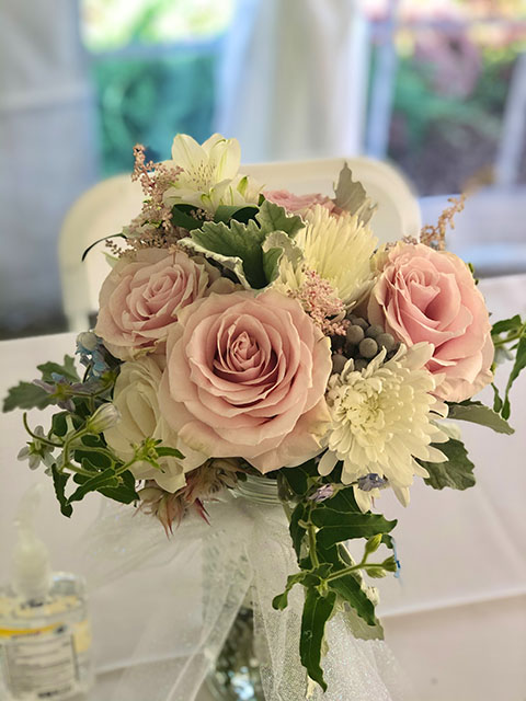 pink and white wedding arrangement